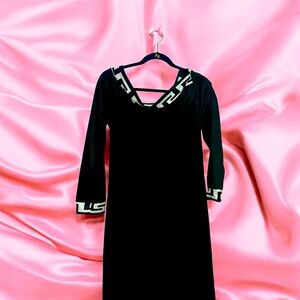 Black knee length dress with Greek key trim